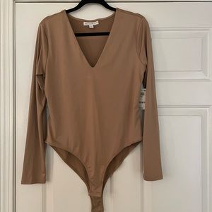 And Now This brand body suit